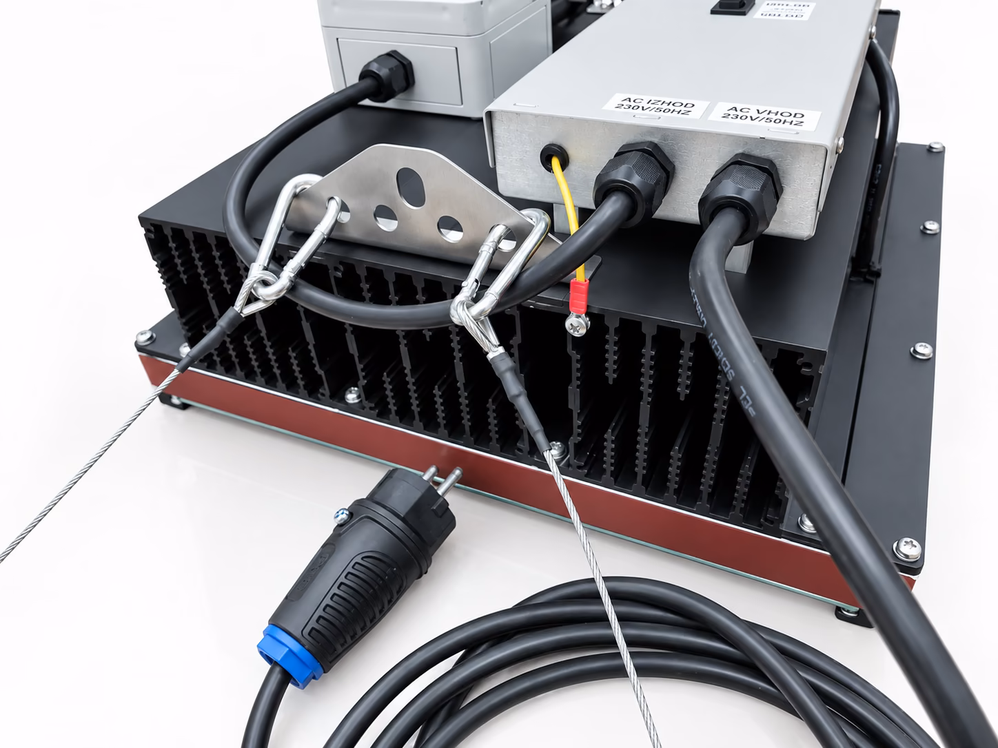 Connections — 230 V AC input, cable glands, safety cables